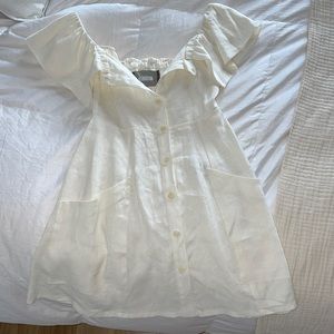 White linen Reformation off the shoulder mini dress
